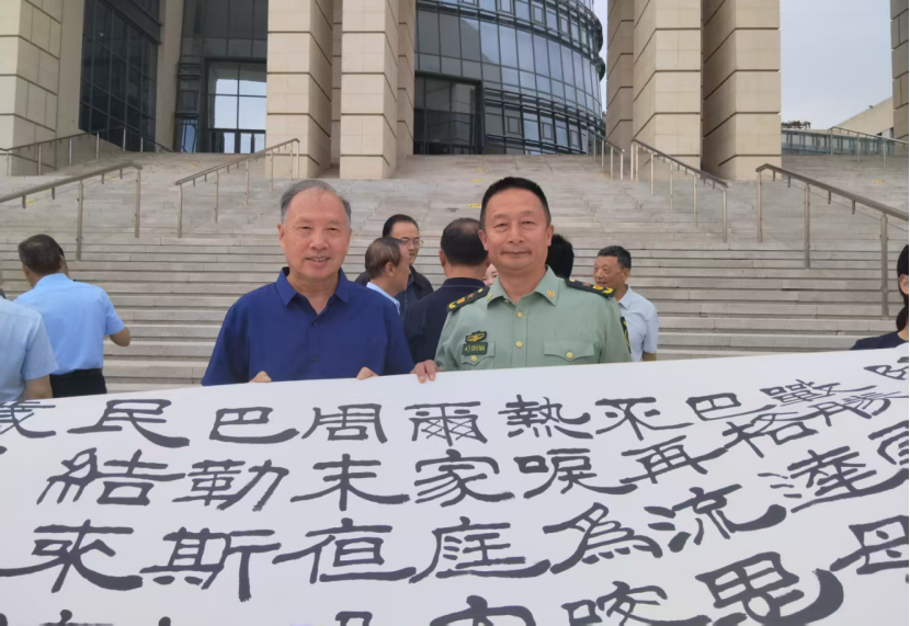 丹青忆峥嵘 翰墨书和平纪念中国人民抗日战争胜利80周年汉隶长卷在渭南隆重展出9999422.png